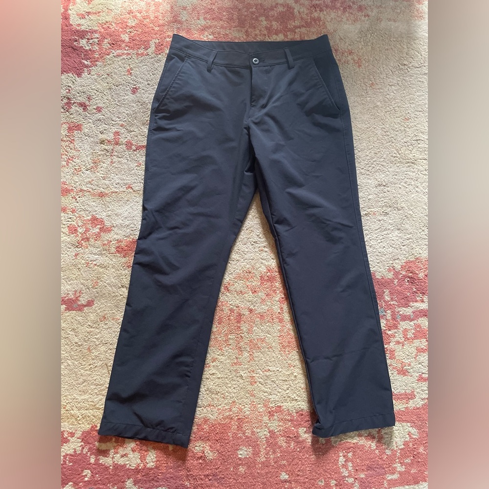 Men’s Under Armour black dress pants.  34W x 30L.  Used. Good condition.